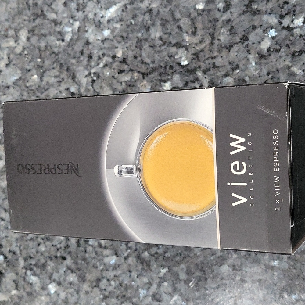 One pair of Nespresso espresso cup &saucer